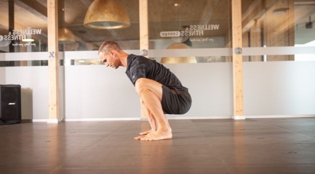 Flow 3 –  Squat to stand to Inchworm